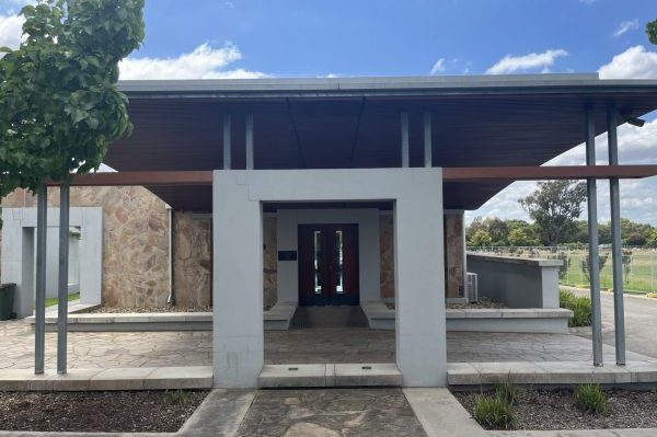 Peaceful Chapel Setting With Wooden Pews and Altar in Melbourne