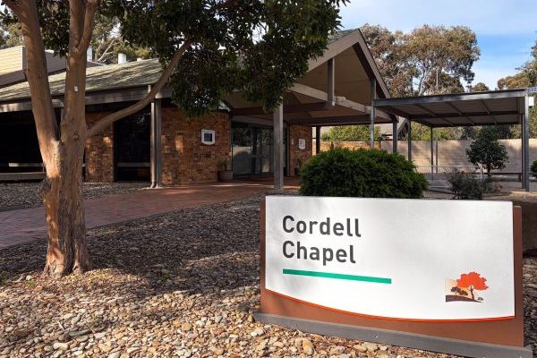 Peaceful Chapel Setting With Wooden Pews and Altar in Melbourne